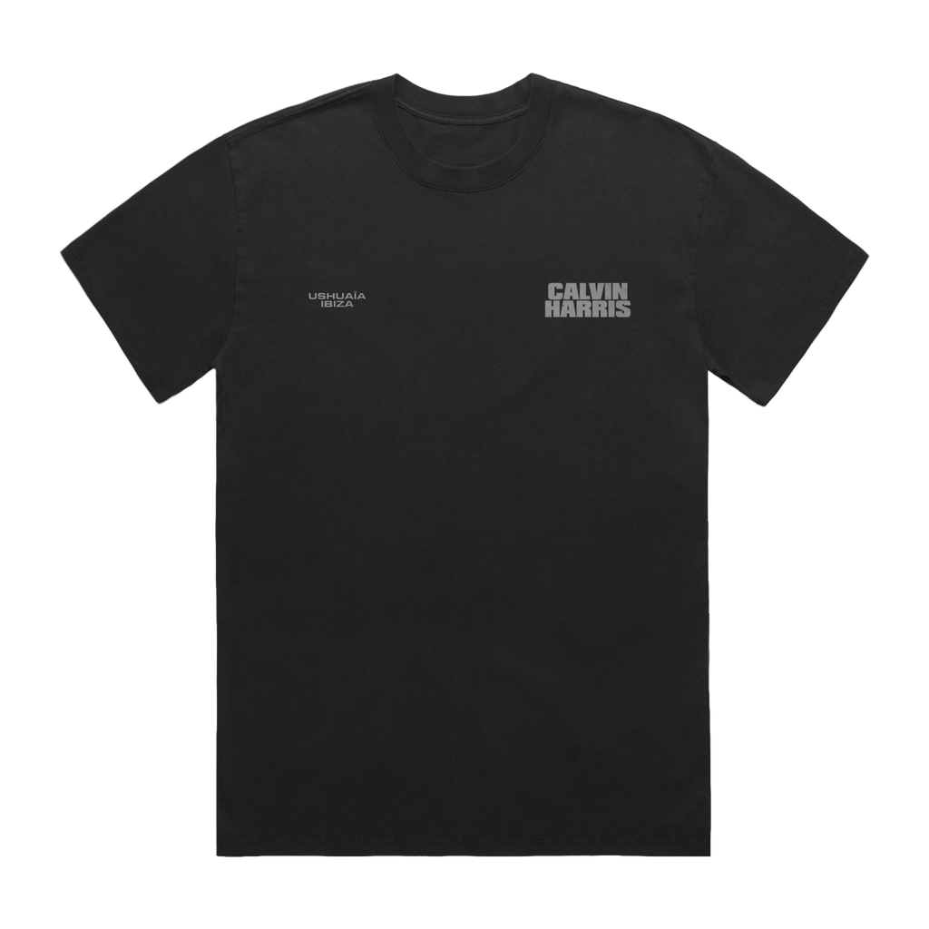 Black short-sleeve T-shirt with small grey “Ushuaïa Ibiza” text on the left chest and bold grey “Calvin Harris” text on the right chest.
