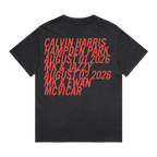 A black short-sleeve t-shirt with a stacked list of names and dates printed in a coral-red font on the back, shown against a plain white background.